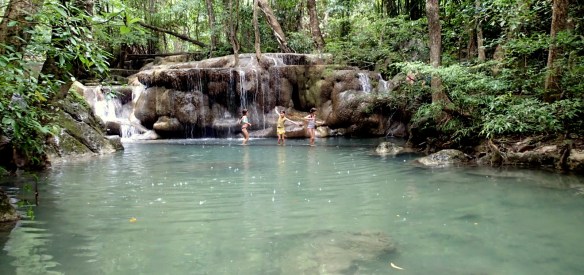 Walking on a submerged log at Erewan Falls